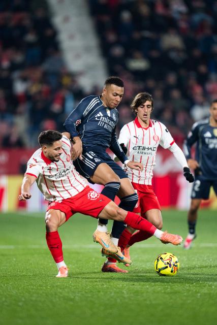 (251201) -- GIRONA, Dec. 1, 2025 (Xinhua) -- Kylian Mbappe (2nd L) of Real Madrid CF competes during the La Liga football match between Girona FC and Real Madrid CF in Montilivi Stadium, Girona, Spain, on Dec. 1, 2025. (Photo by Joan Gosa/Xinhua)