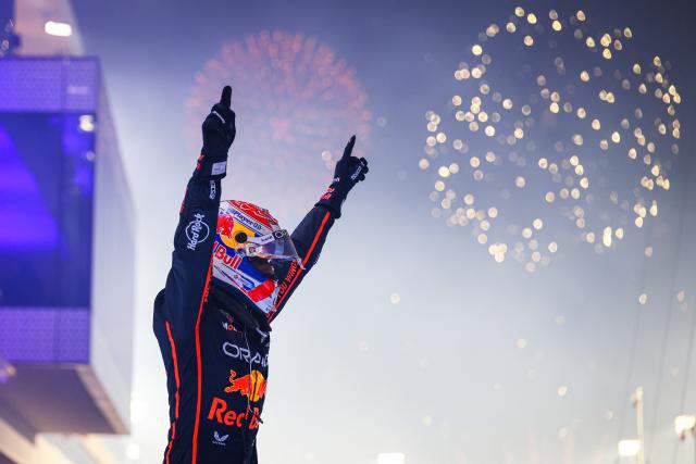 (251201) -- DOHA, Dec. 1, 2025 (Xinhua) -- Red Bull's Dutch Driver Max Verstappen celebrates his win after the Formula One Qatar Grand Prix at the Lusail International Circuit in Doha, Qatar, on Nov. 30, 2025. (Photo by Liu Minghao/Xinhua)