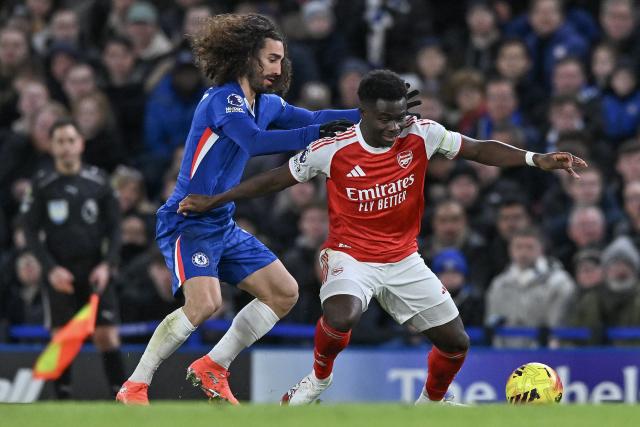 (251201) -- LONDON, Dec. 1, 2025 (Xinhua) -- Marc Cucurella (R) of Chelsea battles with Bukayo Saka of Arsenal during the English Premier League match between Arsenal FC and Chelsea FC in London, Britain, on Nov. 30, 2025.
FOR EDITORIAL USE ONLY. NOT FOR SALE FOR MARKETING OR ADVERTISING CAMPAIGNS. NO USE WITH UNAUTHORIZED AUDIO, VIDEO, DATA, FIXTURE LISTS, CLUB/LEAGUE LOGOS OR "LIVE" SERVICES. ONLINE IN-MATCH USE LIMITED TO 45 IMAGES, NO VIDEO EMULATION. NO USE IN BETTING, GAMES OR SINGLE CLUB/LEAGUE/PLAYER PUBLICATIONS. (Xinhua)