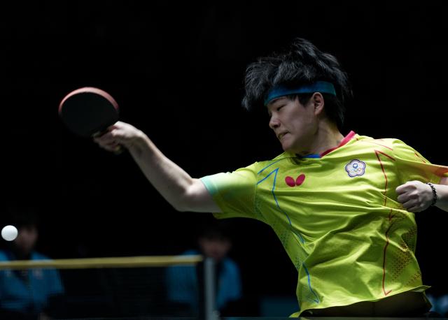 (251201) -- CHENGDU, Dec. 1, 2025 (Xinhua) -- Lin Yen-Chun of Chinese Taipei competes during the men's singles match against Jang Woojin of South Korea in the stage 1 group match between South Korea and Chinese Taipei at the ITTF Mixed Team World Cup 2025 in Chengdu, southwest China's Sichuan Province, Dec. 1, 2025. (Xinhua/Wang Ying)