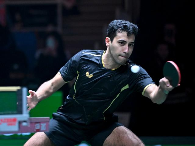(251201) -- CHENGDU, Dec. 1, 2025 (Xinhua) -- Youssef Abdelaziz of Egypt competes in the men's singles match against Wang Chuqin of China during the stage 1 group match between China and Egypt at the ITTF Mixed Team World Cup 2025 in Chengdu, southwest China's Sichuan Province, Dec. 1, 2025. (Xinhua/Xu Bingjie)