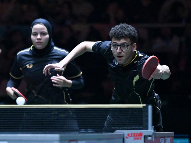 (251201) -- CHENGDU, Dec. 1, 2025 (Xinhua) -- Badr Mostafa (R)/Marwa Alhodaby of Egypt compete in the mixed doubles match against Lin Shidong/Kuai Man of China during the stage 1 group match between China and Egypt at the ITTF Mixed Team World Cup 2025 in Chengdu, southwest China's Sichuan Province, Dec. 1, 2025. (Xinhua/Xu Bingjie)