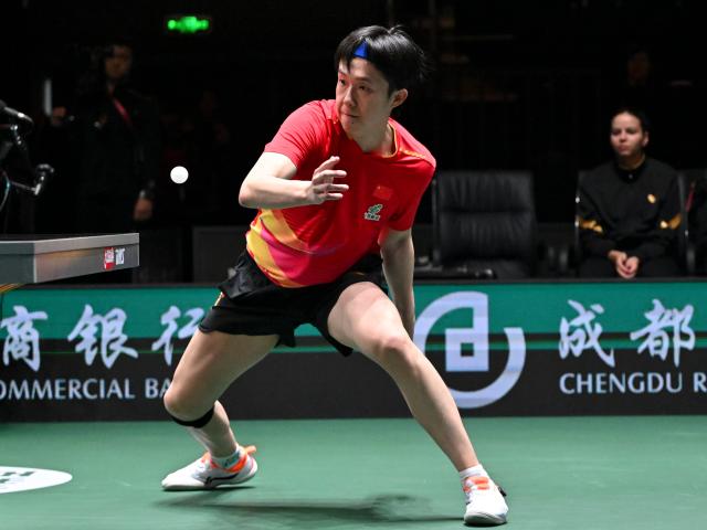 (251201) -- CHENGDU, Dec. 1, 2025 (Xinhua) -- Wang Chuqin of China competes in the men's singles match against Youssef Abdelaziz of Egypt during the stage 1 group match between China and Egypt at the ITTF Mixed Team World Cup 2025 in Chengdu, southwest China's Sichuan Province, Dec. 1, 2025. (Xinhua/Xu Bingjie)