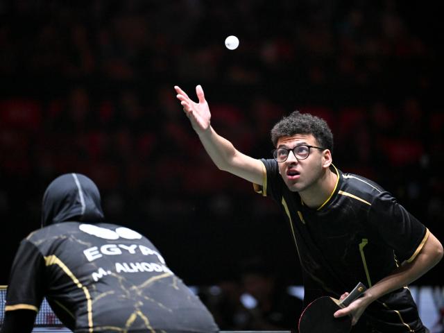 (251201) -- CHENGDU, Dec. 1, 2025 (Xinhua) -- Badr Mostafa (R)/Marwa Alhodaby of Egypt compete in the mixed doubles match against Lin Shidong/Kuai Man of China during the stage 1 group match between China and Egypt at the ITTF Mixed Team World Cup 2025 in Chengdu, southwest China's Sichuan Province, Dec. 1, 2025. (Xinhua/Xu Bingjie)