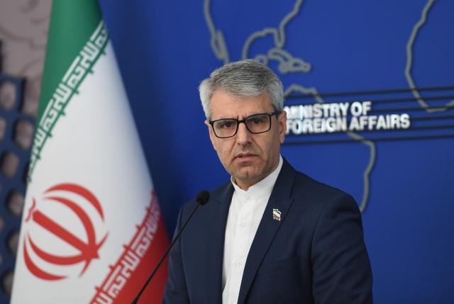 (251201) -- TEHRAN, Dec. 1, 2025 (Xinhua) -- Iranian Foreign Ministry spokesman Esmaeil Baghaei attends a press conference in Tehran, Iran, Dec 1, 2025. Baghaei said on Monday the United States has become the "biggest threat" to international peace and security due to its recent behaviors towards other countries. (Xinhua/Shadati)