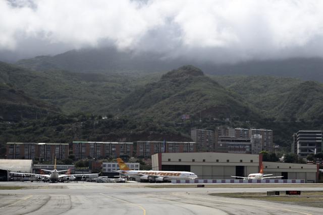(251201) -- CARACAS, Dec. 1, 2025 (Xinhua) -- Passenger aircraft are pictured at the Simon Bolivar International Airport in Maiquetia, Venezuela, Dec. 1, 2025. (Xinhua/Li Muzi)