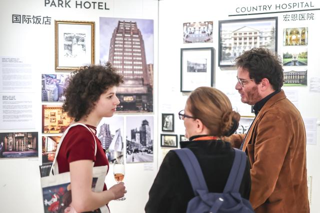 (251202) -- BUDAPEST, Dec. 2, 2025 (Xinhua) -- Visitors communicate at the exhibition "Timeless Modernity -- The Shanghai Legacy of Hungarian Architects" in Budapest, Hungary, Dec. 1, 2025. The exhibition opened in Budapest on Monday, highlighting the contributions of Hungarian architects to Shanghai's urban development in the first half of the 20th century.
   Jointly organized by the China Cultural Center in Budapest and the Hungarian-Chinese Friendship Association, the exhibition showcases the architectural achievements of four Hungarian architects, including Laszlo Hudec, Karoly Gonda, Bela Matrai, and Rudolf Somjen. Through photographs, films, archival documents, models, and installations, it illustrates how their modernist designs became integrated into the evolution of Shanghai's urban landscape. (Photo by David Balogh/Xinhua)