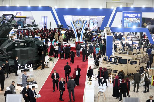 (251202) -- CAIRO, Dec. 2, 2025 (Xinhua) -- People visit the Egypt Defense Expo in Cairo, Egypt, on Dec. 1, 2025. The four-day Egypt Defense Expo, being held at the Egypt International Exhibition Centre, features over 400 defense and security companies displaying the latest military technology, equipment and systems across land, sea and air domains, and attracts military personnel, government officials, international delegations and industry professionals. (Xinhua/Ahmed Gomaa)