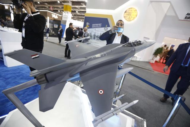(251202) -- CAIRO, Dec. 2, 2025 (Xinhua) -- This photo taken on Dec. 1, 2025 shows a fighter plane model at the Egypt Defense Expo in Cairo, Egypt. The four-day Egypt Defense Expo, being held at the Egypt International Exhibition Centre, features over 400 defense and security companies displaying the latest military technology, equipment and systems across land, sea and air domains, and attracts military personnel, government officials, international delegations and industry professionals. (Xinhua/Ahmed Gomaa)