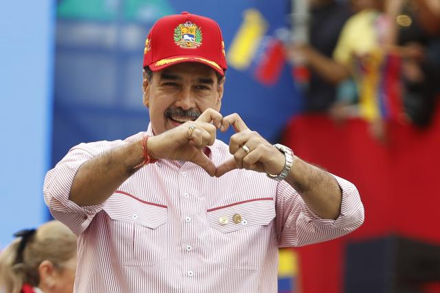 (251202) -- CARACAS, Dec. 2, 2025 (Xinhua) -- Venezuelan President Nicolas Maduro gestures during a rally in Caracas, capital of Venezuela, Dec. 1, 2025. Venezuela does not want "a slave's peace," Venezuelan President Nicolas Maduro told supporters Monday as U.S. military deployment has been "testing" his country for months.
   "We want peace, but peace with sovereignty, peace with equality, peace with freedom; we do not want the peace of slaves or the peace of colonies. A colony never, slaves never," Maduro declared, noting that the 22-week U.S. military "aggression" can be described as "psychological terrorism." (Str/Xinhua)