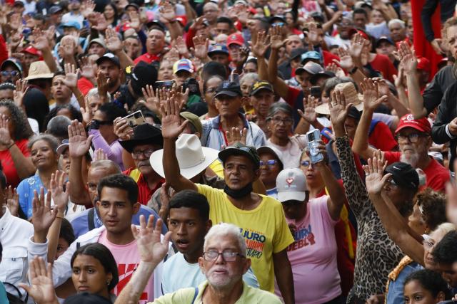 (251202) -- CARACAS, Dec. 2, 2025 (Xinhua) -- People attend a rally in Caracas, capital of Venezuela, Dec. 1, 2025. Venezuela does not want "a slave's peace," Venezuelan President Nicolas Maduro told supporters Monday as U.S. military deployment has been "testing" his country for months.
   "We want peace, but peace with sovereignty, peace with equality, peace with freedom; we do not want the peace of slaves or the peace of colonies. A colony never, slaves never," Maduro declared, noting that the 22-week U.S. military "aggression" can be described as "psychological terrorism." (Str/Xinhua)