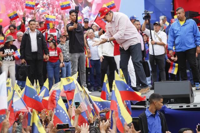 (251202) -- CARACAS, Dec. 2, 2025 (Xinhua) -- Venezuelan President Nicolas Maduro gestures during a rally in Caracas, capital of Venezuela, Dec. 1, 2025. Venezuela does not want "a slave's peace," Venezuelan President Nicolas Maduro told supporters Monday as U.S. military deployment has been "testing" his country for months.
   "We want peace, but peace with sovereignty, peace with equality, peace with freedom; we do not want the peace of slaves or the peace of colonies. A colony never, slaves never," Maduro declared, noting that the 22-week U.S. military "aggression" can be described as "psychological terrorism." (Str/Xinhua)