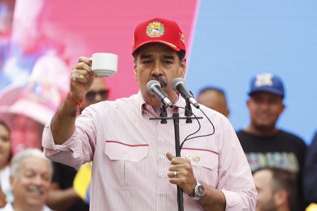 (251202) -- CARACAS, Dec. 2, 2025 (Xinhua) -- Venezuelan President Nicolas Maduro speaks during a rally in Caracas, capital of Venezuela, Dec. 1, 2025. Venezuela does not want "a slave's peace," Venezuelan President Nicolas Maduro told supporters Monday as U.S. military deployment has been "testing" his country for months.
   "We want peace, but peace with sovereignty, peace with equality, peace with freedom; we do not want the peace of slaves or the peace of colonies. A colony never, slaves never," Maduro declared, noting that the 22-week U.S. military "aggression" can be described as "psychological terrorism." (Str/Xinhua)