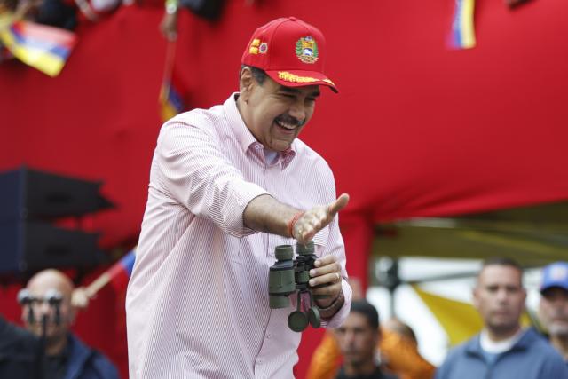 (251202) -- CARACAS, Dec. 2, 2025 (Xinhua) -- Venezuelan President Nicolas Maduro gestures during a rally in Caracas, capital of Venezuela, Dec. 1, 2025. Venezuela does not want "a slave's peace," Venezuelan President Nicolas Maduro told supporters Monday as U.S. military deployment has been "testing" his country for months.
   "We want peace, but peace with sovereignty, peace with equality, peace with freedom; we do not want the peace of slaves or the peace of colonies. A colony never, slaves never," Maduro declared, noting that the 22-week U.S. military "aggression" can be described as "psychological terrorism." (Str/Xinhua)