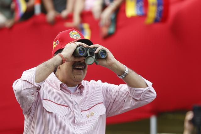 (251202) -- CARACAS, Dec. 2, 2025 (Xinhua) -- Venezuelan President Nicolas Maduro attends a rally in Caracas, capital of Venezuela, Dec. 1, 2025. Venezuela does not want "a slave's peace," Venezuelan President Nicolas Maduro told supporters Monday as U.S. military deployment has been "testing" his country for months.
   "We want peace, but peace with sovereignty, peace with equality, peace with freedom; we do not want the peace of slaves or the peace of colonies. A colony never, slaves never," Maduro declared, noting that the 22-week U.S. military "aggression" can be described as "psychological terrorism." (Str/Xinhua)