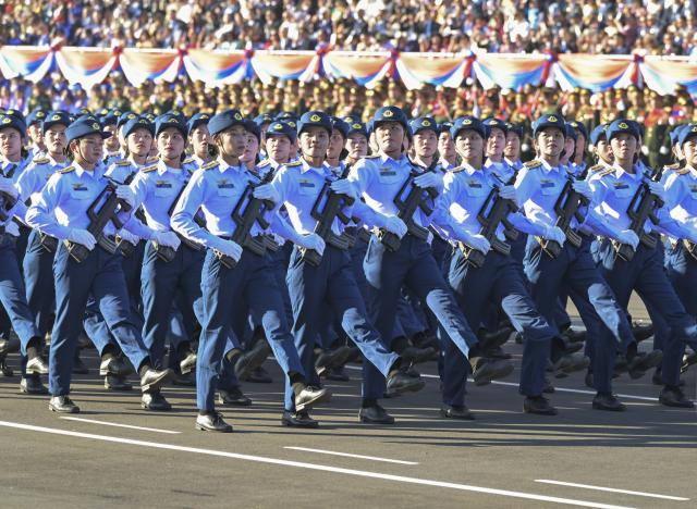 (251202) -- VIENTIANE, Dec. 2, 2025 (Xinhua) -- This photo taken on Dec. 2, 2025 shows a scene during an event in Vientiane to celebrate the 50th anniversary of the founding of the Lao People's Democratic Republic. A grand mass march and a military parade were held in Vientiane on Tuesday. (Xinhua/Gao Jie)