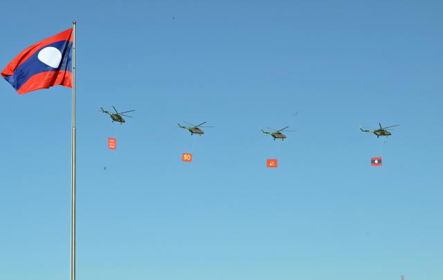 (251202) -- VIENTIANE, Dec. 2, 2025 (Xinhua) -- This photo taken on Dec. 2, 2025 shows a scene during an event in Vientiane to celebrate the 50th anniversary of the founding of the Lao People's Democratic Republic. A grand mass march and a military parade were held in Vientiane on Tuesday. (Xinhua/Gao Jie)