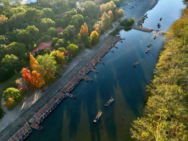 (251202) -- WUYISHAN, Dec. 2, 2025 (Xinhua) -- This aerial drone photo taken on Nov. 30, 2025 shows a dock of the Jiuqu River at Wuyishan National Park in southeast China's Fujian Province. (Xinhua/Jiang Kehong)