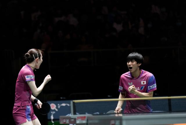 (251202) -- CHENGDU, Dec. 2, 2025 (Xinhua) -- Hayata Hina/Togami Shunsuke (R) of Japan celebrate in the mixed doubles match against Ivor Ban/Hana Arapovic of Croatia during the stage 1 group match between Japan and Croatia at the ITTF Mixed Team World Cup 2025 in Chengdu, southwest China's Sichuan Province, Dec. 2, 2025. (Xinhua/Wang Ying)