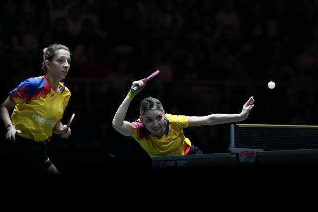 (251202) -- CHENGDU, Dec. 2, 2025 (Xinhua) -- Bernadette Szocs (R)/Elizabeta Samara of Romania compete during the women's doubles match against Yuan Jia Nan/Prithika Pavade of France during the stage 1 group match between France and Romania at the ITTF Mixed Team World Cup 2025 in Chengdu, southwest China's Sichuan Province, Dec. 2, 2025. (Xinhua/Wang Ying)