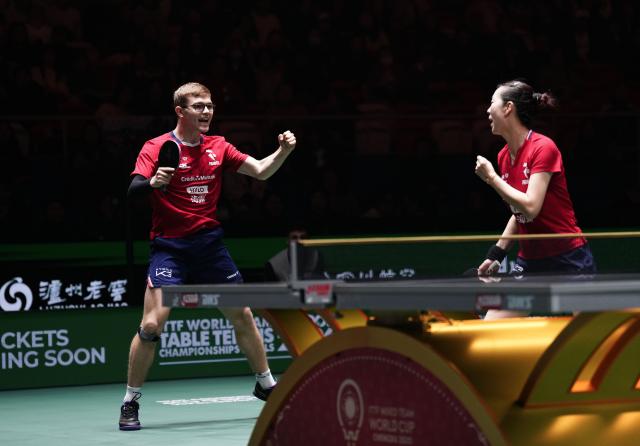 (251202) -- CHENGDU, Dec. 2, 2025 (Xinhua) -- Alexis Lebrun (L)/Yuan Jia Nan of France celebrate in the mixed doubles match against Ovidiu Ionescu/Bernadette Szocs of Romania during the stage 1 group match between France and Romania at the ITTF Mixed Team World Cup 2025 in Chengdu, southwest China's Sichuan Province, Dec. 2, 2025. (Xinhua/Wang Ying)