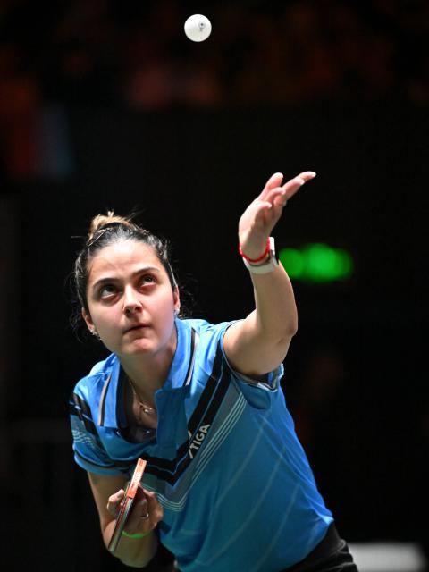 (251202) -- CHENGDU, Dec. 2, 2025 (Xinhua) -- Daniela Ortega of Chile competes in the women's singles match against Wang Manyu of China during the stage 1 group match between China and Chile at the ITTF Mixed Team World Cup 2025 in Chengdu, southwest China's Sichuan Province, Dec. 2, 2025. (Xinhua/Xu Bingjie)