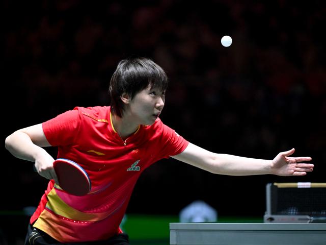 (251202) -- CHENGDU, Dec. 2, 2025 (Xinhua) -- Wang Manyu of China competes in the women's singles match against Daniela Ortega of Chile during the stage 1 group match between China and Chile at the ITTF Mixed Team World Cup 2025 in Chengdu, southwest China's Sichuan Province, Dec. 2, 2025. (Xinhua/Xu Bingjie)