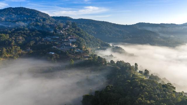 (251202) -- PU'ER, Dec. 2, 2025 (Xinhua) -- An aerial drone photo taken on Dec. 1, 2025 shows the scenery in Jingmai Mountain of Lancang Lahu Autonomous County in Pu'er City, southwest China's Yunnan Province. (Xinhua/Hu Chao)