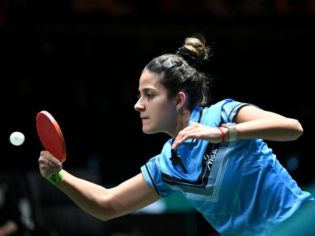 (251202) -- CHENGDU, Dec. 2, 2025 (Xinhua) -- Daniela Ortega of Chile competes in the women's singles match against Wang Manyu of China during the stage 1 group match between China and Chile at the ITTF Mixed Team World Cup 2025 in Chengdu, southwest China's Sichuan Province, Dec. 2, 2025. (Xinhua/Xu Bingjie)