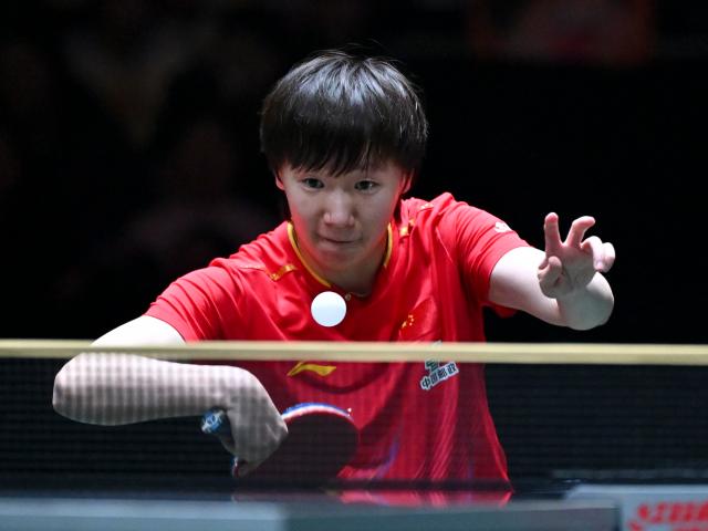 (251202) -- CHENGDU, Dec. 2, 2025 (Xinhua) -- Wang Manyu of China competes in the women's singles match against Daniela Ortega of Chile during the stage 1 group match between China and Chile at the ITTF Mixed Team World Cup 2025 in Chengdu, southwest China's Sichuan Province, Dec. 2, 2025. (Xinhua/Xu Bingjie)