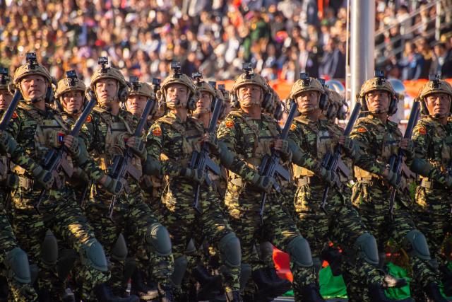 (251202) -- VIENTIANE, Dec. 2, 2025 (Xinhua) -- Lao soldiers participate in a military parade marking the 50th anniversary of the founding of the Lao People's Democratic Republic in Vientiane, Laos, Dec. 2, 2025. Laos is alive with celebrations honoring five decades of steady national growth as the country marks the 50th anniversary of the founding of the Lao People's Democratic Republic on Tuesday.
  The 50th anniversary celebrations began Tuesday morning with a grand parade, broadcast live on television, as residents across the country joined the festivities. (Xinhua/Zhao Xu)