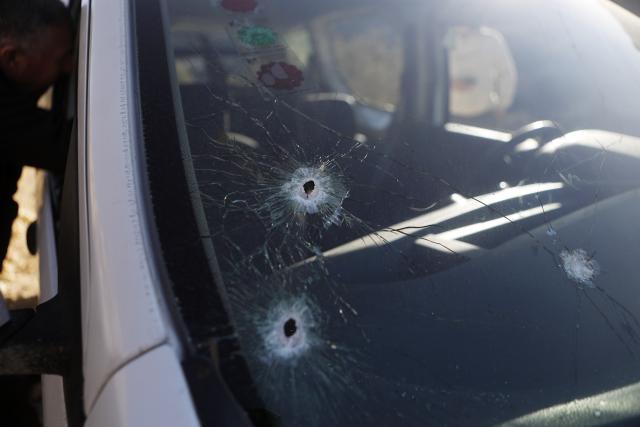 (251202) -- HEBRON, Dec. 2, 2025 (Xinhua) -- This photo shows bullet holes on the car of Muhannad Tariq Mohammad Al-Zgheer who was killed by the Israeli forces, in the West Bank city of Hebron, Dec. 2, 2025. The Palestinian Health Ministry said 17-year-old Muhannad Tariq Mohammad Al-Zgheer was shot dead in Hebron and that Israeli forces kept his body. Palestinian security officials said the shooting occurred as Israeli troops shut down northern checkpoints during a manhunt after an Israeli soldier was run over at a nearby military checkpoint. (Photo by Mamoun Wazwaz/Xinhua)