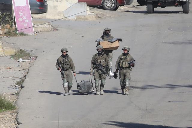 (251202) -- NABLUS, Dec. 2, 2025 (Xinhua) -- Israeli forces are seen during a military raid in the West Bank city of Nablus, Dec. 2, 2025. (Photo by Nidal Eshtayeh/Xinhua)