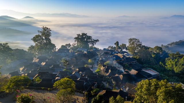 (251203) -- BEIJING, Dec. 3, 2025 (Xinhua) -- An aerial drone photo taken on Dec. 1, 2025 shows a view of Wengji Village in Lancang Lahu Autonomous County of Pu'er City, southwest China's Yunnan Province. (Xinhua/Hu Chao)