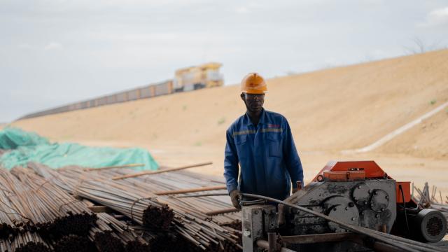 (251203) -- Maputo, Dec. 3, 2025 (Xinhua) -- An employee of the China Railway 20th Bureau Group Corporation Limited (CR20) takes part in upgrading work at the old Nacala Port in Nacala City, Mozambique, Nov. 22, 2025. TO GO WITH "Feature: Chinese company drives upgrade of Mozambique's Nacala corridor" (Xinhua/Liu Jie)
