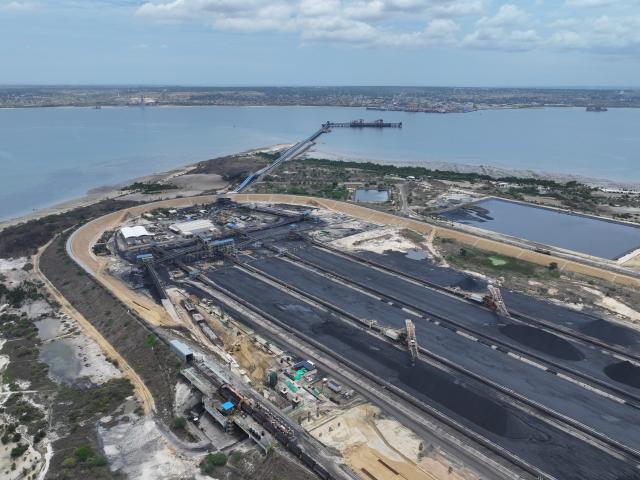 (251203) -- Maputo, Dec. 3, 2025 (Xinhua) -- An aerial drone photo shows a view of the coal terminal at the old Nacala Port in Nacala City, Mozambique, Nov. 22, 2025. TO GO WITH "Feature: Chinese company drives upgrade of Mozambique's Nacala corridor" (Xinhua/Liu Jie)