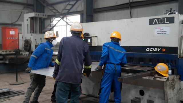 (251203) -- Maputo, Dec. 3, 2025 (Xinhua) -- Employees of the China Railway 20th Bureau Group Corporation Limited (CR20) carry out maintenance work in Nacala City, Mozambique, Nov. 21, 2025. TO GO WITH "Feature: Chinese company drives upgrade of Mozambique's Nacala corridor" (Xinhua/Liu Jie)