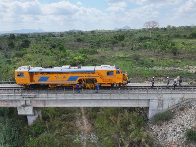 (251203) -- Maputo, Dec. 3, 2025 (Xinhua) -- An aerial drone photo shows employees of the China Railway 20th Bureau Group Corporation Limited (CR20) carrying out maintenance work on the Nacala corridor railway in Mozambique, Nov. 28, 2025. TO GO WITH "Feature: Chinese company drives upgrade of Mozambique's Nacala corridor" (Xinhua/Liu Jie)