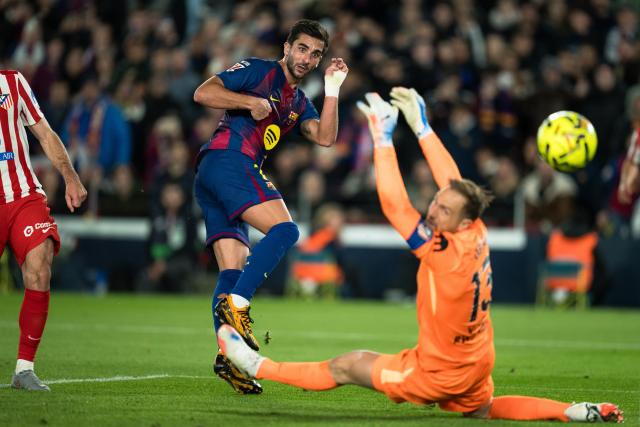 (251203) -- BARCELONA, Dec. 3, 2025 (Xinhua) -- Ferran Torres of Barcelona shoots and scores during the La Liga football match between FC Barcelona and Atletico de Madrid in Barcelona, Spain, on Dec. 3, 2025. (Photo by Joan Gosa/Xinhua)