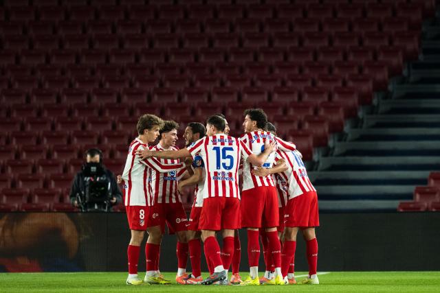 (251203) -- BARCELONA, Dec. 3, 2025 (Xinhua) -- Players of Atletico de Madrid celebrate a goal by Alex Baena during the La Liga football match between FC Barcelona and Atletico de Madrid in Barcelona, Spain, on Dec. 3, 2025. (Photo by Joan Gosa/Xinhua)