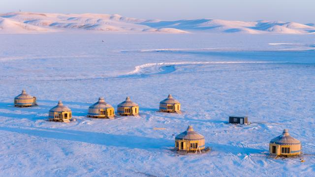 (251203) -- HULUN BUIR, Dec. 3, 2025 (Xinhua) -- An aerial drone photo taken on Dec. 3, 2025 shows yurts on the snow-covered Chenbarhu Banner Grassland in Hulun Buir, north China's Inner Mongolia Autonomous Region. (Xinhua/Ma Jinrui)