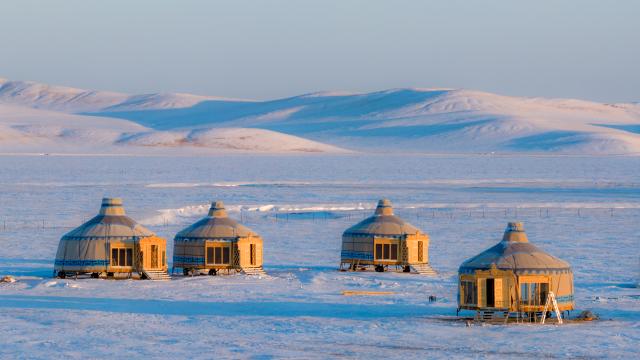 (251203) -- HULUN BUIR, Dec. 3, 2025 (Xinhua) -- A drone photo taken on Dec. 3, 2025 shows yurts on the snow-covered Chenbarhu Banner Grassland in Hulun Buir, north China's Inner Mongolia Autonomous Region. (Xinhua/Ma Jinrui)