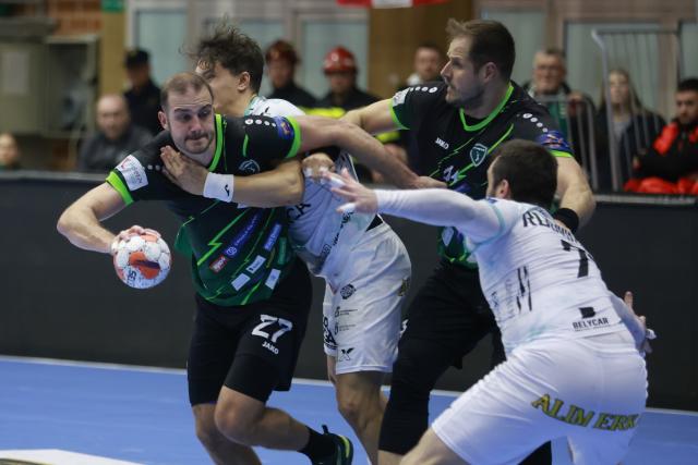 (251203) -- NASICE, Dec. 3 (Xinhua) -- Luka Moslavac (1st L) of RK Nexe competes during the EHF European League 2025/2026 Group H match between RK Nexe and Abanca Ademar Leon in Nasice, Croatia, Dec. 2, 2025. (Photo by Davor Javorovic/PIXSELL via Xinhua)
