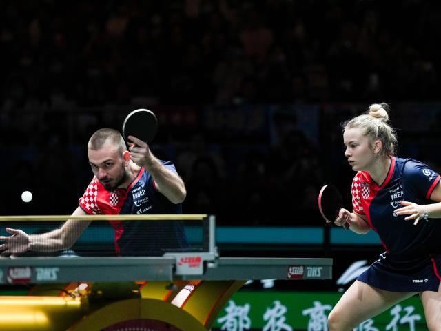 (251203) -- CHENGDU, Dec. 3, 2025 (Xinhua) -- Ivor Ban(L)/Hana Arapovic of Croatia compete during the mixed doubles match against Wang Chuqin/Sun Yingsha of China during the stage 2 match between China and Croatia at the ITTF Mixed Team World Cup 2025 in Chengdu, southwest China's Sichuan Province, Dec. 3, 2025. (Xinhua/Wang Xi)