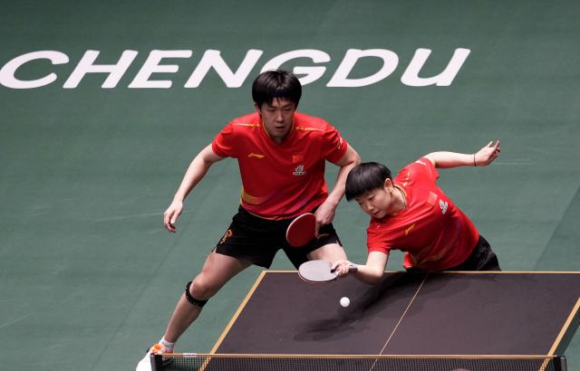 (251203) -- CHENGDU, Dec. 3, 2025 (Xinhua) -- Wang Chuqin/Sun Yingsha(R) of China compete during the mixed doubles match against Ivor Ban/Hana Arapovic of Croatia during the stage 2 match between China and Croatia at the ITTF Mixed Team World Cup 2025 in Chengdu, southwest China's Sichuan Province, Dec. 3, 2025. (Xinhua/Wang Ying)