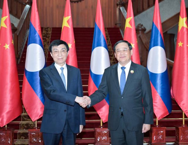 (251203) -- VIENTIANE, Dec. 3, 2025 (Xinhua) -- Wang Huning, a member of the Standing Committee of the Political Bureau of the Communist Party of China (CPC) Central Committee and chairman of the National Committee of the Chinese People's Political Consultative Conference (CPPCC), meets with Lao Prime Minister Sonexay Siphandone in Vientiane, Laos, Dec. 1, 2025. Wang led a Chinese party and government delegation on an official visit to Laos from Dec. 1 to 3, and attended celebrations marking the 50th anniversary of the founding of the Lao People's Democratic Republic.
Wang and his delegation arrived here at the invitation of the Lao People's Revolutionary Party (LPRP) Central Committee and the Lao government. (Xinhua/Gao Jie)