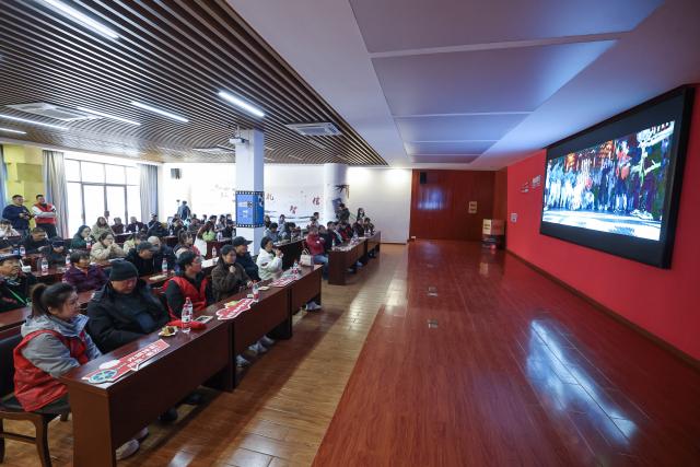 (251204) -- JIAXING, Dec. 4, 2025 (Xinhua) -- Visually-impaired audience accompanied by volunteers watch the movie "One and Only" at a cinema in Jiaxing, east China's Zhejiang Province, Dec. 3, 2025. Wednesday marks the 34th International Day of Persons with Disabilities. Visually-impaired people enjoyed a barrier-free version of the movie "One and Only" here in Nanhu District of Jiaxing. The activity was under the Cinema of Light, a volunteer project initiated by faculty and students of the Communication University of China (CUC) in 2017 to produce films with voice descriptions of the visual content. (Xinhua/Xu Yu)