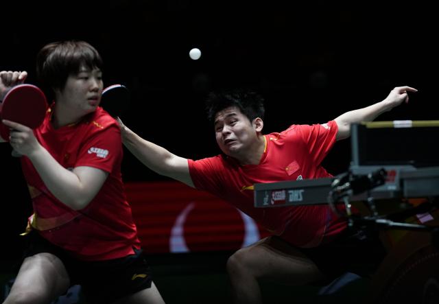 (251204) -- CHENGDU, Dec. 4, 2025 (Xinhua) -- Lin Shidong(R)/Kuai Man of China compete during the mixed doubles match against Park Ganghyeon/Kim Nayeong of South Korea during the stage 2 group match between China and South Korea at the ITTF Mixed Team World Cup 2025 in Chengdu, southwest China's Sichuan Province, Dec. 4, 2025. (Xinhua/Wang Ying)
