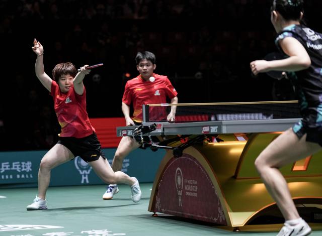 (251204) -- CHENGDU, Dec. 4, 2025 (Xinhua) -- Lin Shidong/Kuai Man (L) of China compete during the mixed doubles match against Park Ganghyeon/Kim Nayeong of South Korea during the stage 2 group match between China and South Korea at the ITTF Mixed Team World Cup 2025 in Chengdu, southwest China's Sichuan Province, Dec. 4, 2025. (Xinhua/Wang Ying)