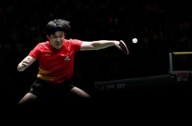 (251204) -- CHENGDU, Dec. 4, 2025 (Xinhua) -- Wang Chuqin of China hits a return during the men's singles match against An Jaehyun of South Korea during the stage 2 group match between China and South Korea at the ITTF Mixed Team World Cup 2025 in Chengdu, southwest China's Sichuan Province, Dec. 4, 2025. (Xinhua/Wang Ying)